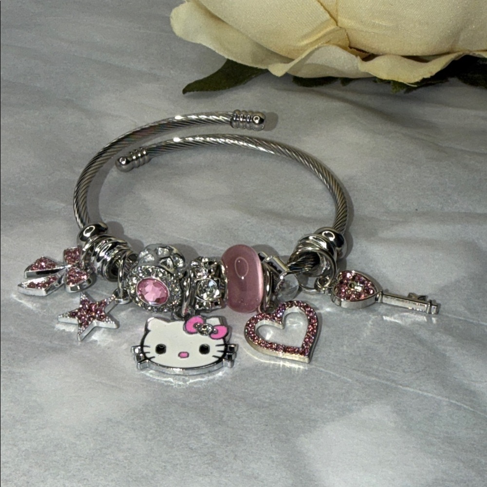 Silver Charm Bangle with Pink Enamel Accents